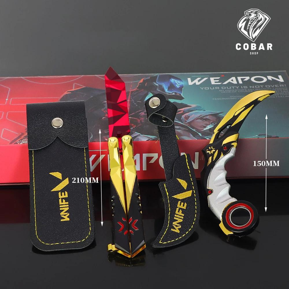 Faca Champions inspirada no game, ideal para fãs e colecionadores. Kit com 2 facas, bainhas, suporte e caixa personalizada. Item decorativo e exclusivo.