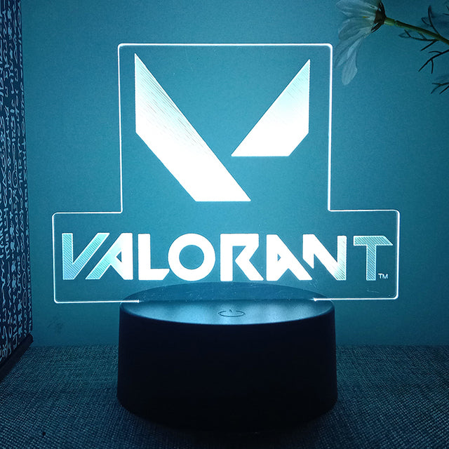 Luminária Valorant com base, cabo e controle remoto. Presente ideal para fãs do jogo. Potência 0-5W, voltagem 5V. Decore com estilo e confiança!