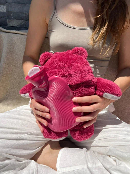 Pelúcia anti-cólica com bolsa térmica removível. Tecido antialérgico, alívio rápido com calor, ideal para todas as idades. Conforto, segurança e fofura.