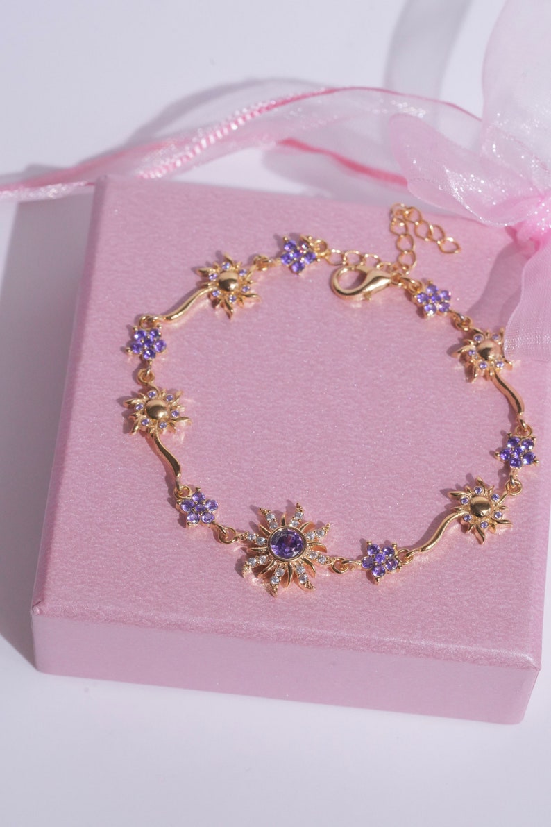 Pulseira Rapunzel Girassol Roxo Com Caixa