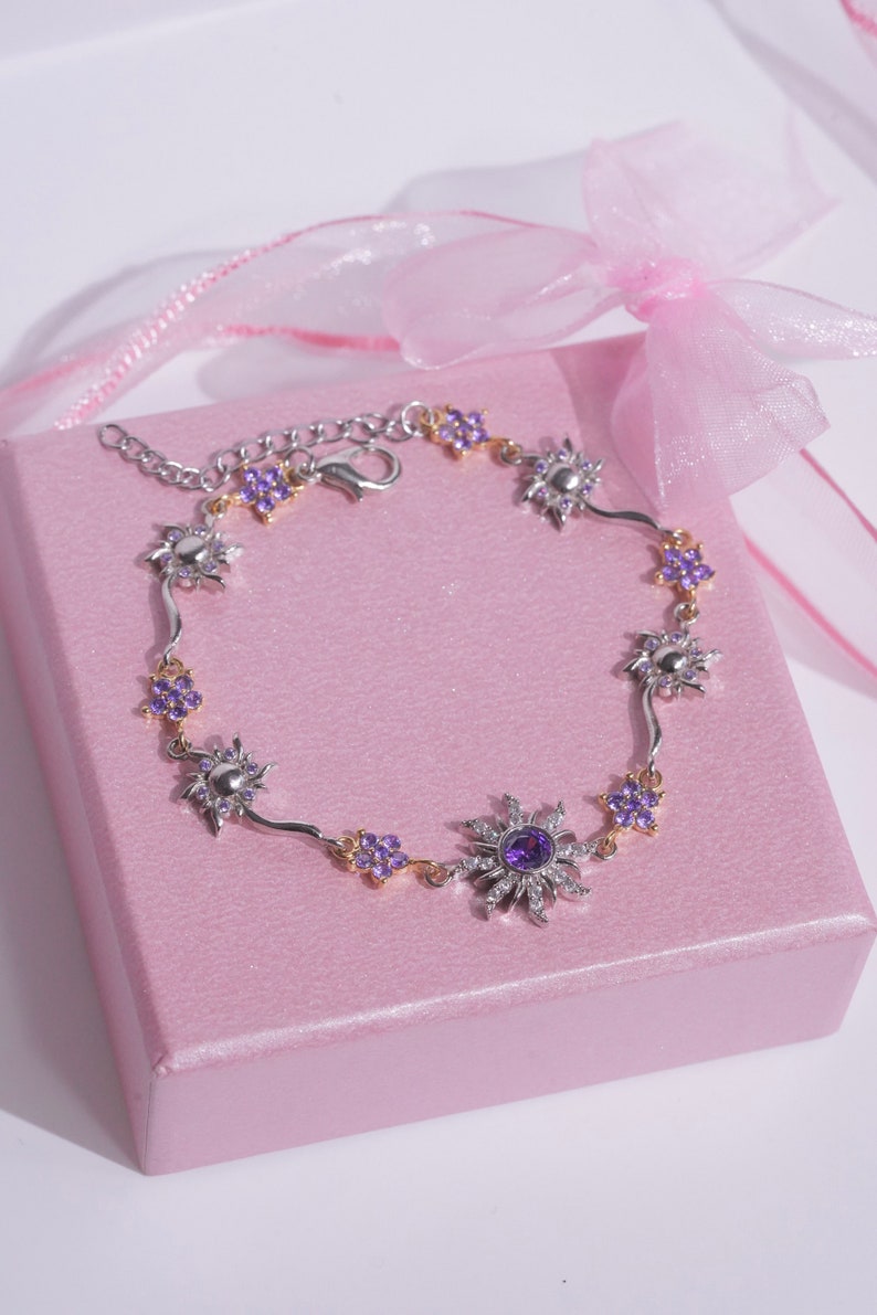 Pulseira Rapunzel Girassol Roxo Com Caixa